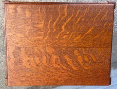 View of strikingly beautiful "book-matched" solid quarter sawed white oak top.